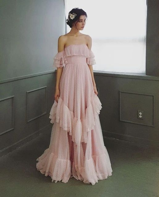image of off shoulder gown with ruffles